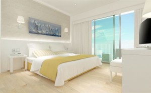 Slaapkamer van het Whala Beach hotel
